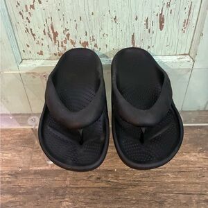 Adult unisex black Mellow Recovery Crocs flip flops